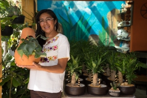 Arely Pavón-Torres and a plant.